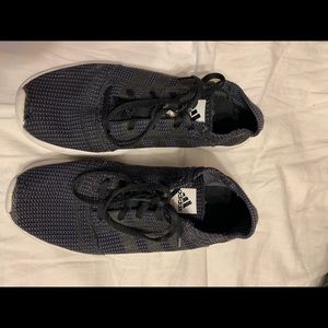 Black adidas running shoes